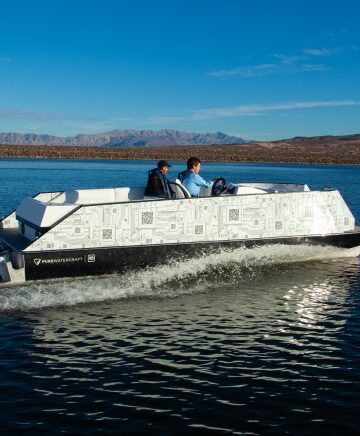 electric pontoon boat on the water